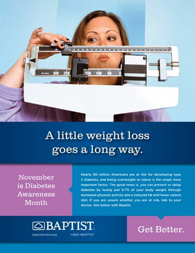 Woman peers over a mechanical bathroom scale, eyes fixed on the numbers against a pale blue background.