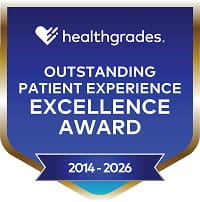 HealthGrades Outstanding Patient Experience Excellence Award from 2014 through 2026 on a blue shield background.